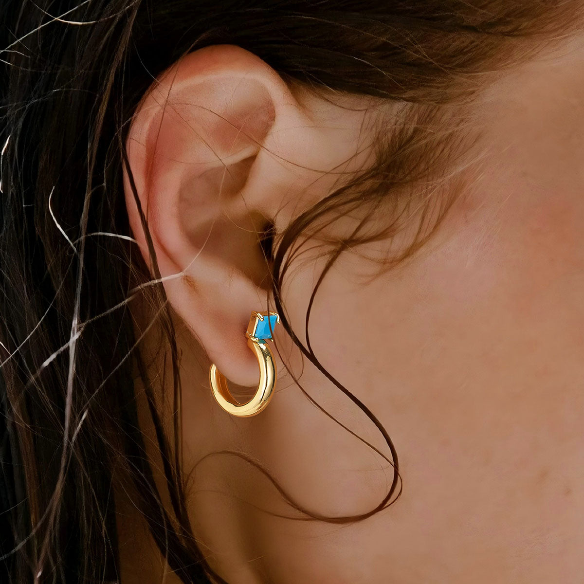 Close-up of model wearing MYEARS® Turquoise Half Hoop Stud Earrings, showing gold setting with turquoise stones, stylish for women’s daily fashion and gift occasions