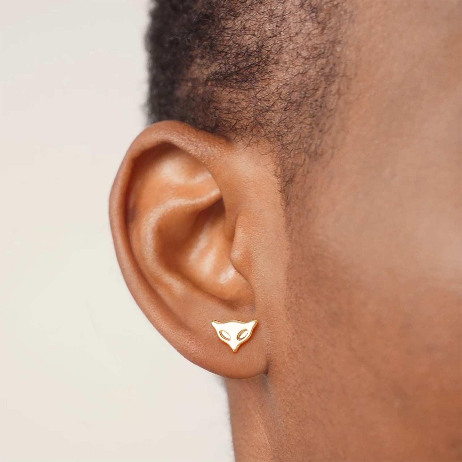 Model wearing MYEARS® gold fox stud earrings set, stylish accessory for women, perfect for everyday wear and gifting.
