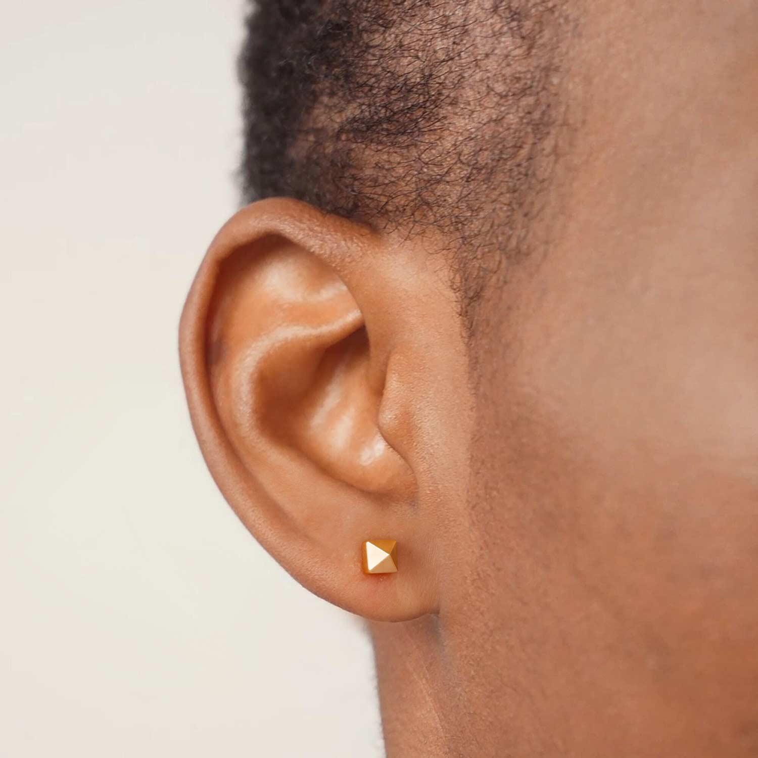 Model wearing MYEARS® Pyramid Stud Earrings Set, stylish gold geometric studs for women, perfect for everyday wear or gifting.
