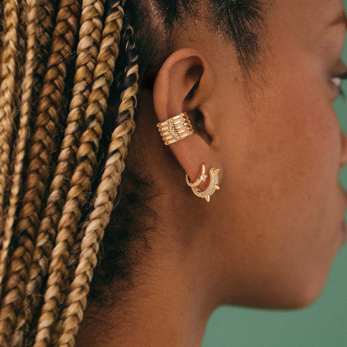 Close-up of MYEARS® Round Single CZ Sleeper Hoop Earrings in gold, sparkling and delicate earrings for women