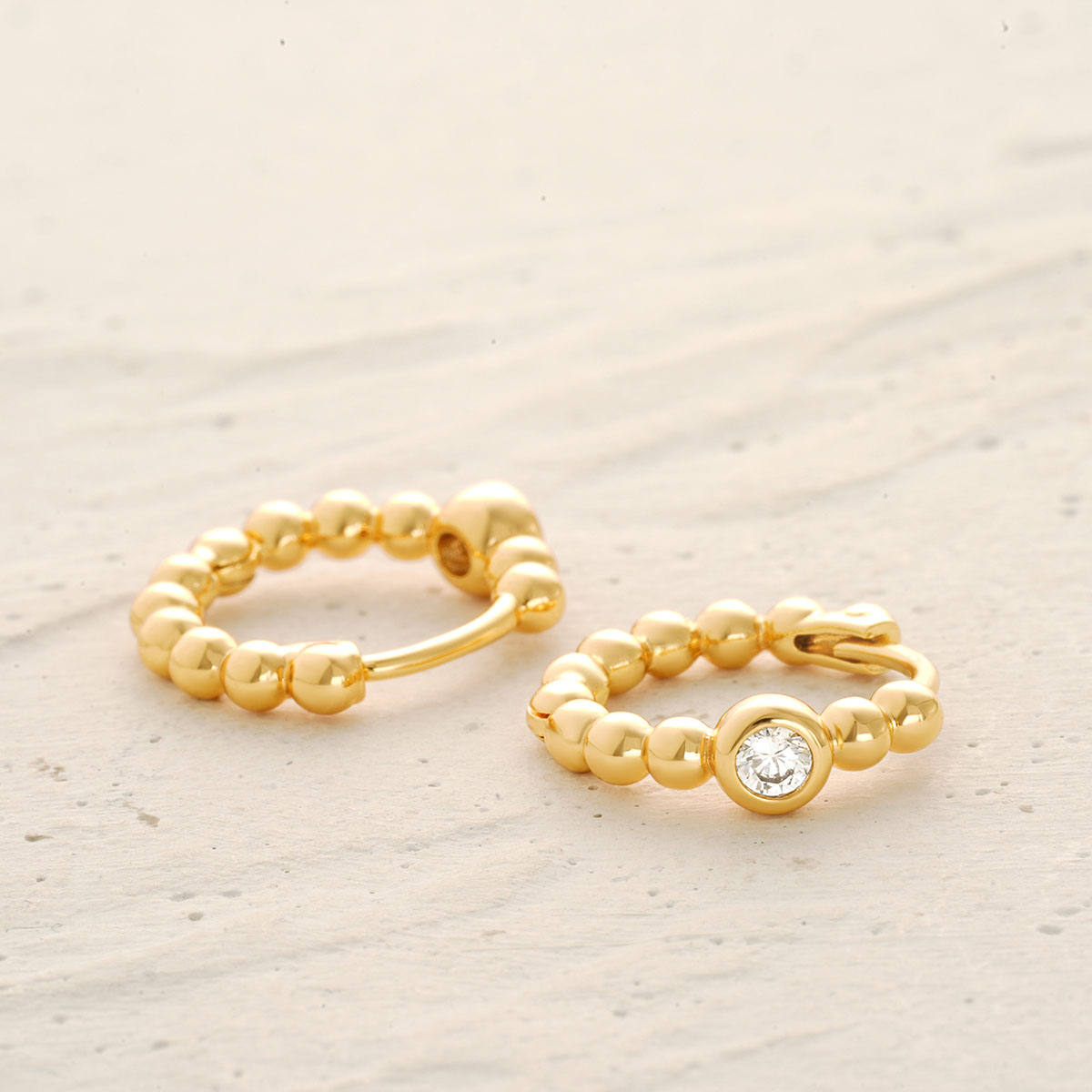 Detailed view of Single CZ Beaded Hoop Earrings in gold, showing cubic zirconia stones and polished finish, perfect gift for women