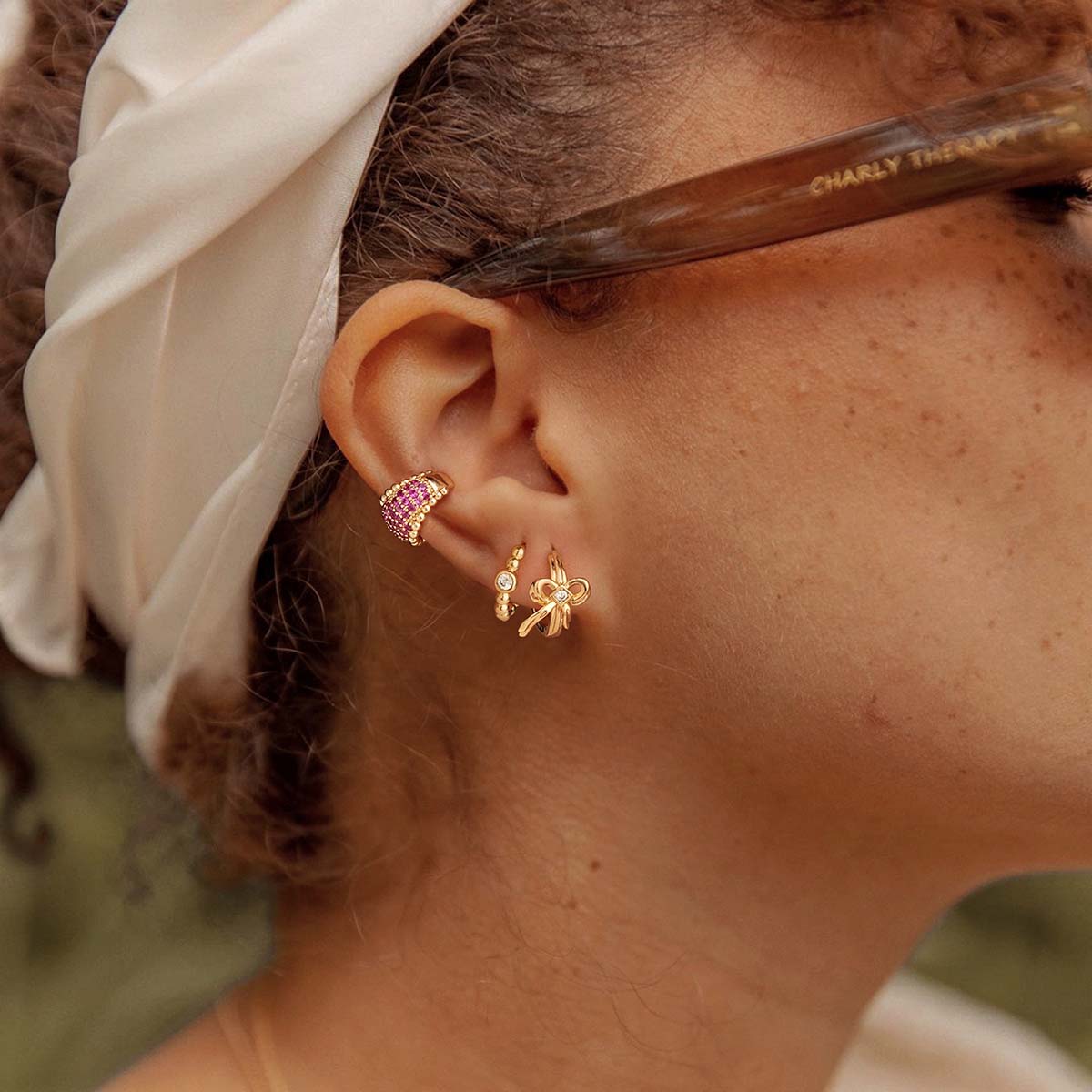 Close-up of MYEARS® Single CZ Beaded Hoop Earrings in gold, sparkling and delicate earrings for women