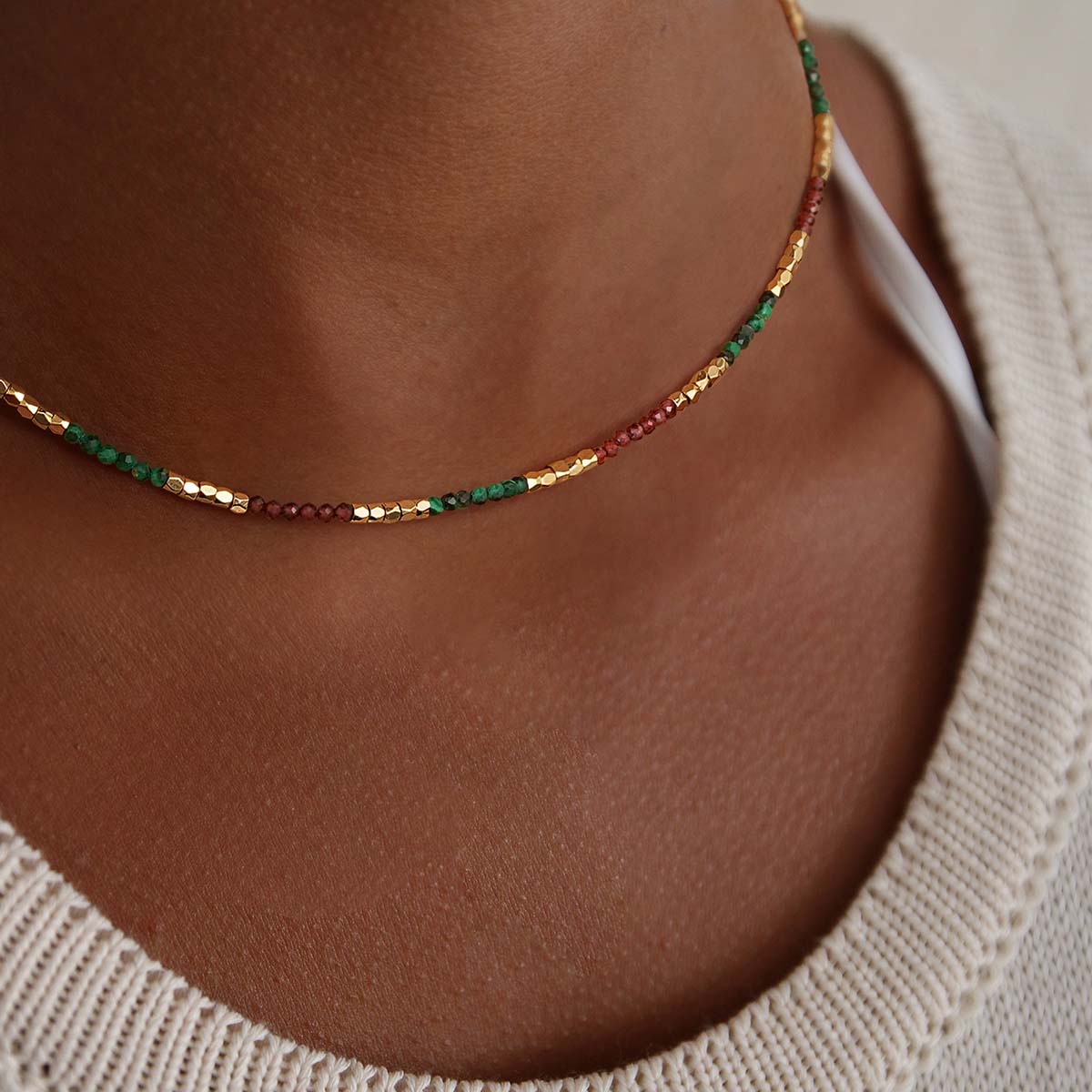 Close-up of a model wearing the Myears® Tourmaline Beaded Choker Necklace with 14K gold details, feminine colorful gemstone jewelry for women.