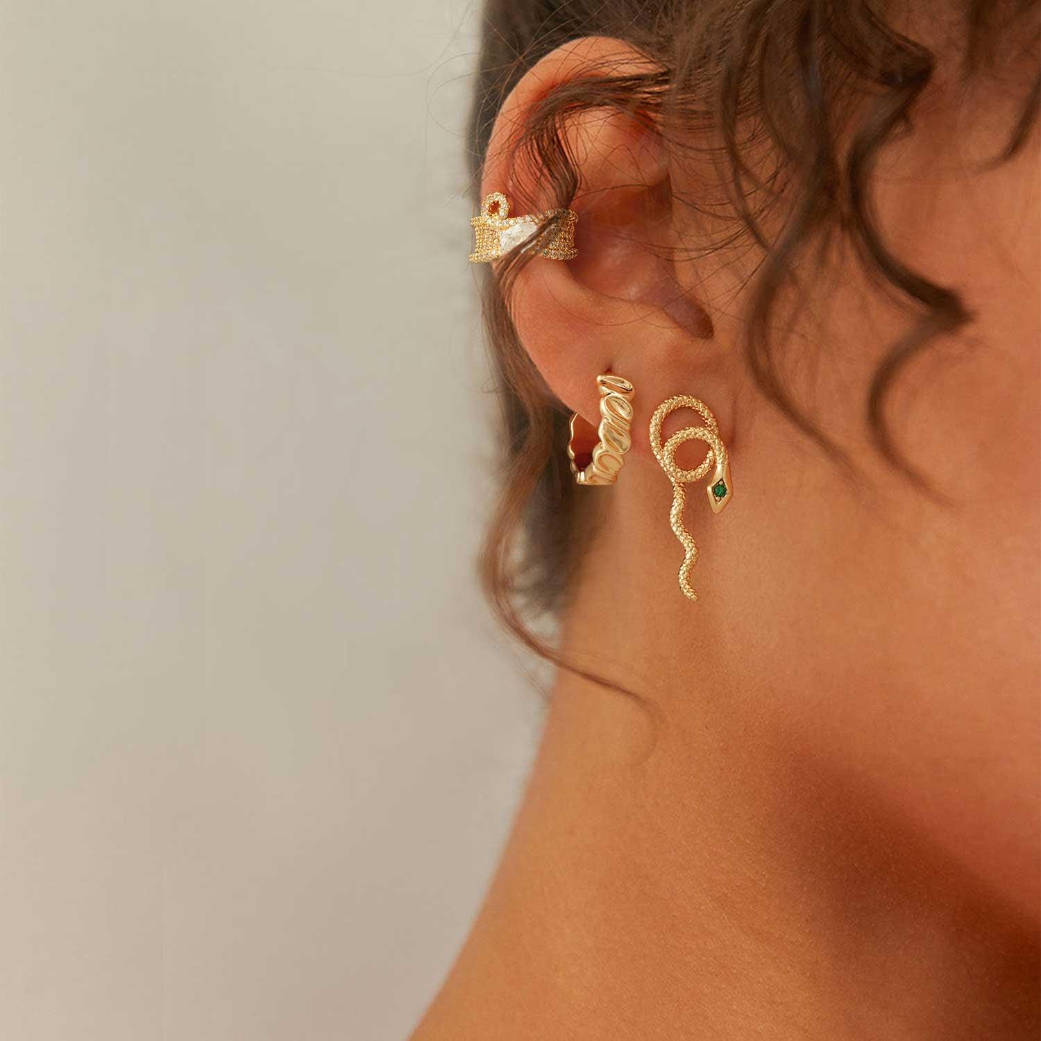 MYEARS® twisted trough band hoop earrings worn by model, everyday wear gold hoops